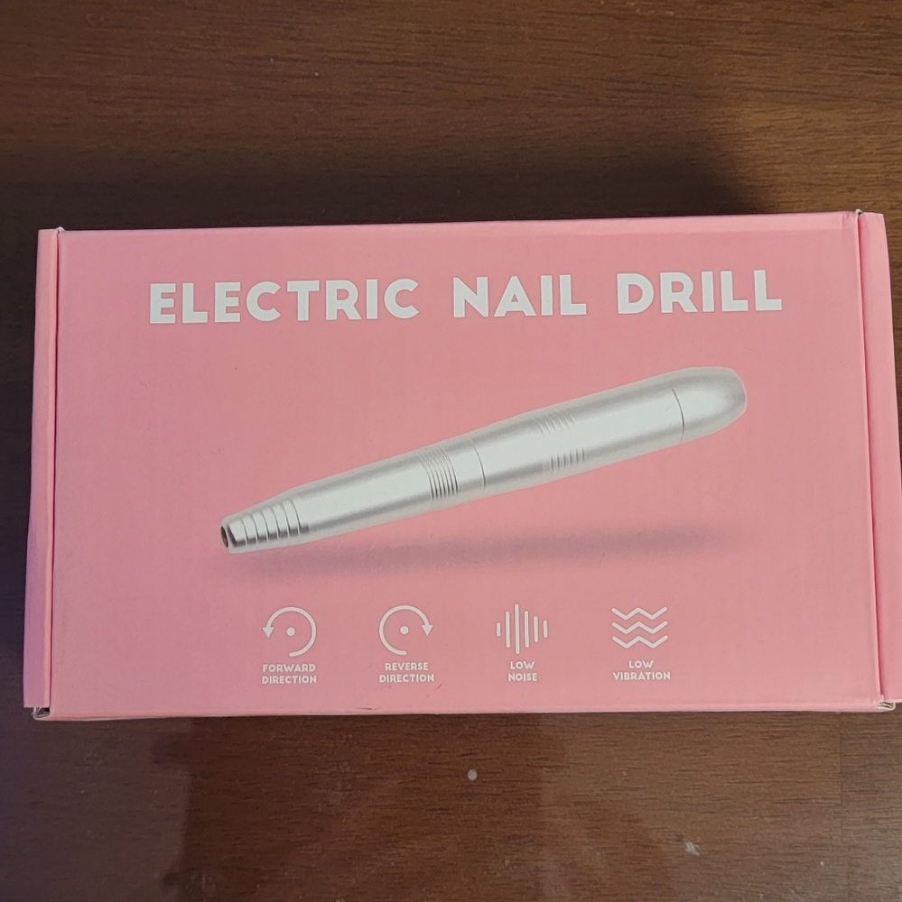 Portable electric nail drill and tons of attachments.